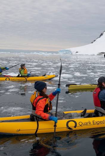 Passengers paddling in the Antarctic