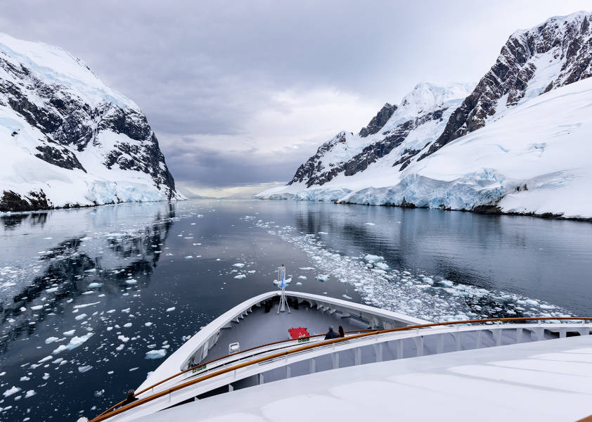 Ship cruising through Antarctica