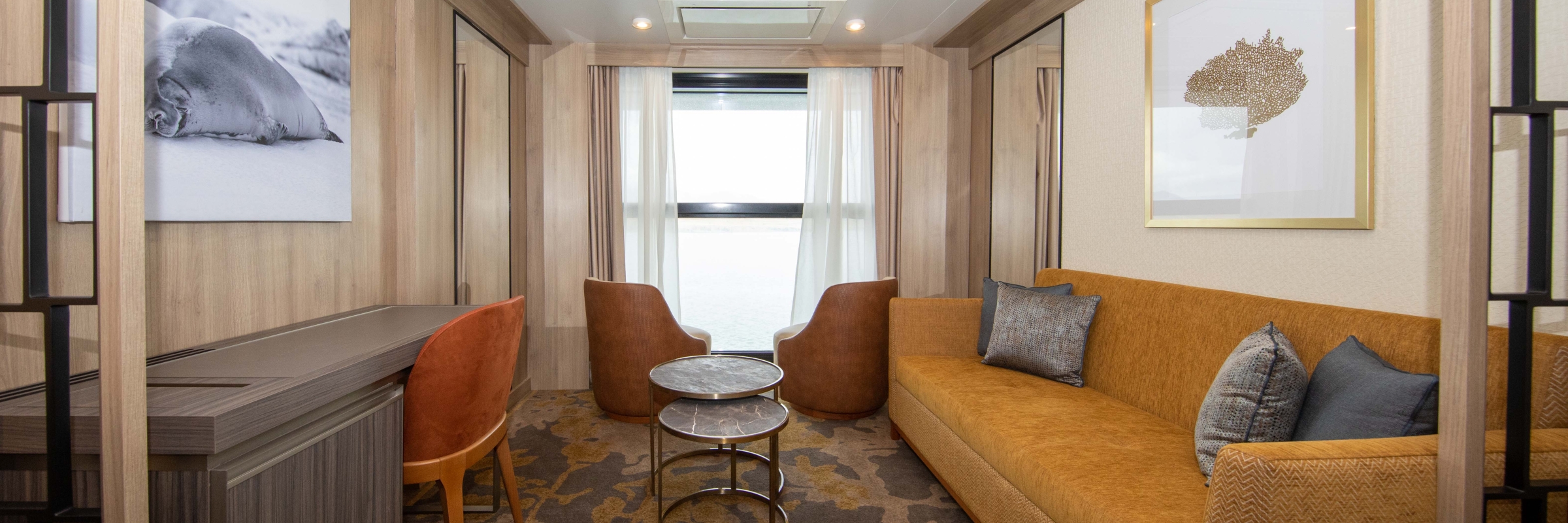 Sitting area in Infinity Suite aboard World Explorer