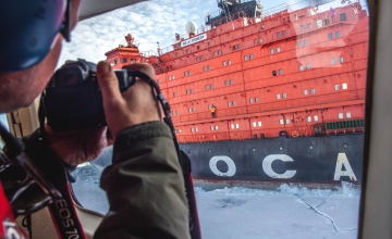 Passenger taking a photo from the helicopter