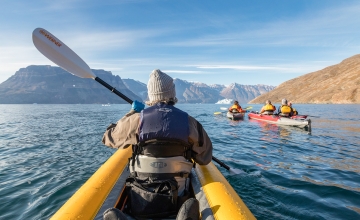 Passengers enjoying the paddling excursion experience 